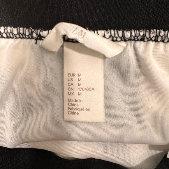 Pleated midi skirt with green and black chevron stripes - Picture 5 of 5